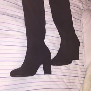 Heeled knee high boots